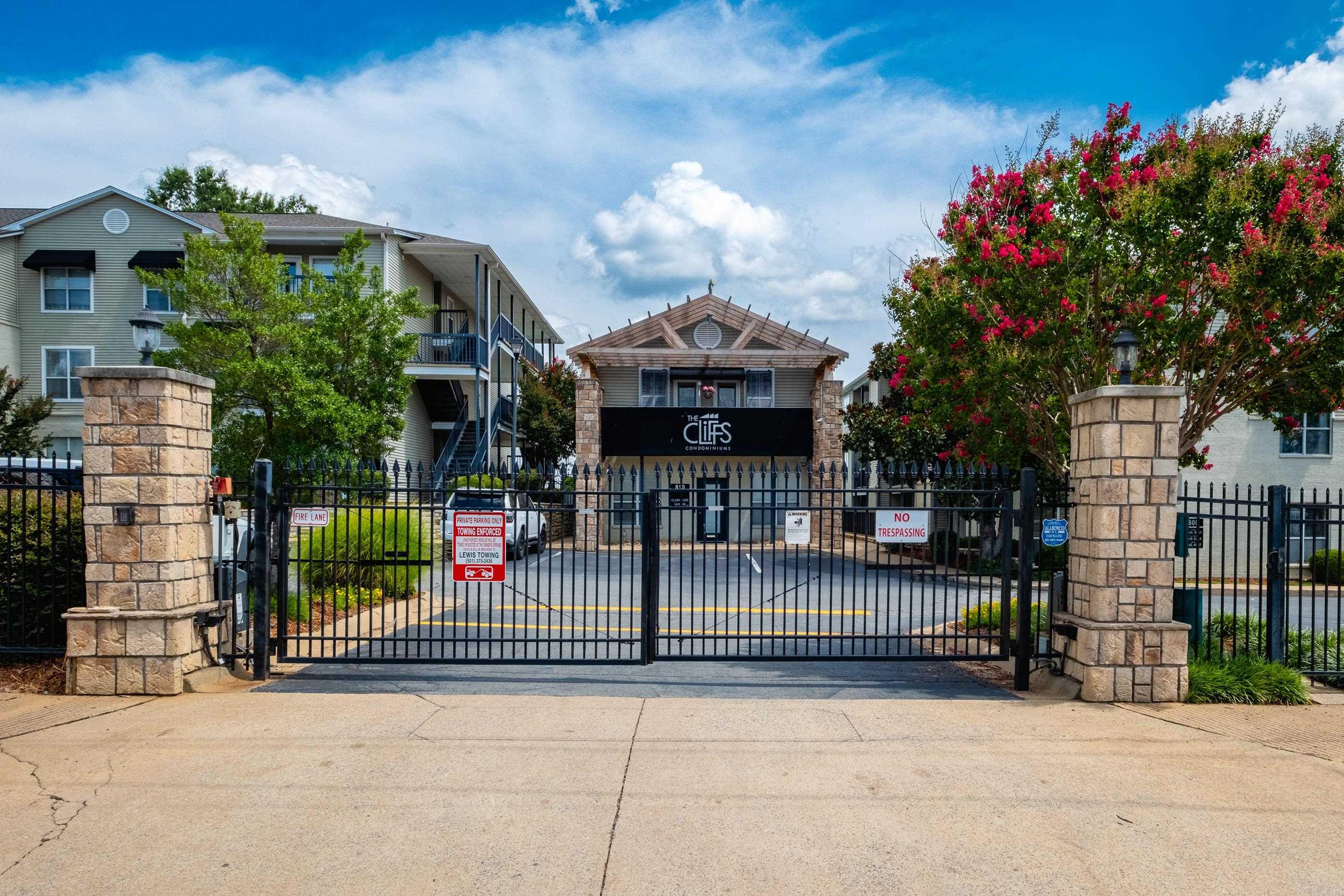 This serene 2-bedroom, 2-bathroom condominium is located on the ground level within The Cliff’s gated community near Downtown Little Rock and the Arkansas River Trail. The home features a smart split floorplan, with a dedicated bathroom serving each bedroom, offering privacy and comfort. Interior features include tile and carpet flooring, a well-appointed kitchen with stainless steel appliances, and a dining area that flows seamlessly into the living area. Enjoy your morning coffee or unwind on the exterior covered patio. A dedicated laundry area with washer and dryer are included for your convenience. The community provides desirable amenities such as a clubhouse, gym, and a sparkling pool. The property is conveniently located near downtown shops, restaurants, interstate access, and the Arkansas River Trail for outdoor recreation. POA fees cover water/sewer, trash, grounds, and common area maintenance, ensuring hassle-free living. Refrigerator, washer, and dryer convey with the sale. This condominium is ideal for those seeking a comfortable lifestyle with urban convenience in a gated setting.