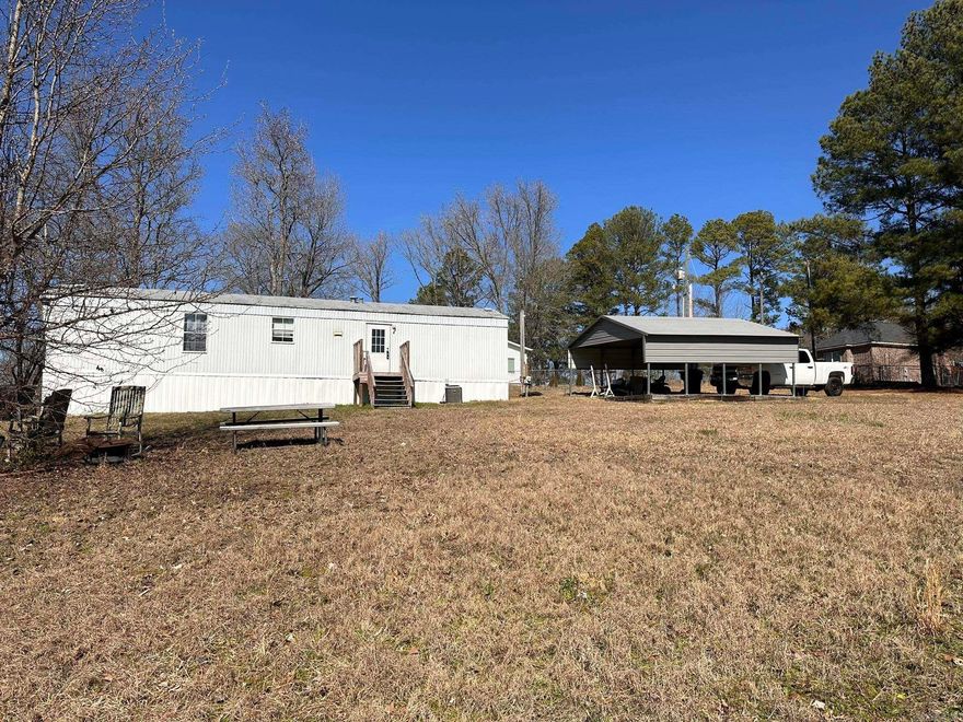Charming 2-bedroom, 1-bathroom home on a stunning 1.3 +/- acre lot, nestled at the peaceful end of the road. Enjoy tranquility with no through traffic. The single wide mobile home is in good condition, and it's located in the highly sought-after Lakeside school district.  Property is sold as is.