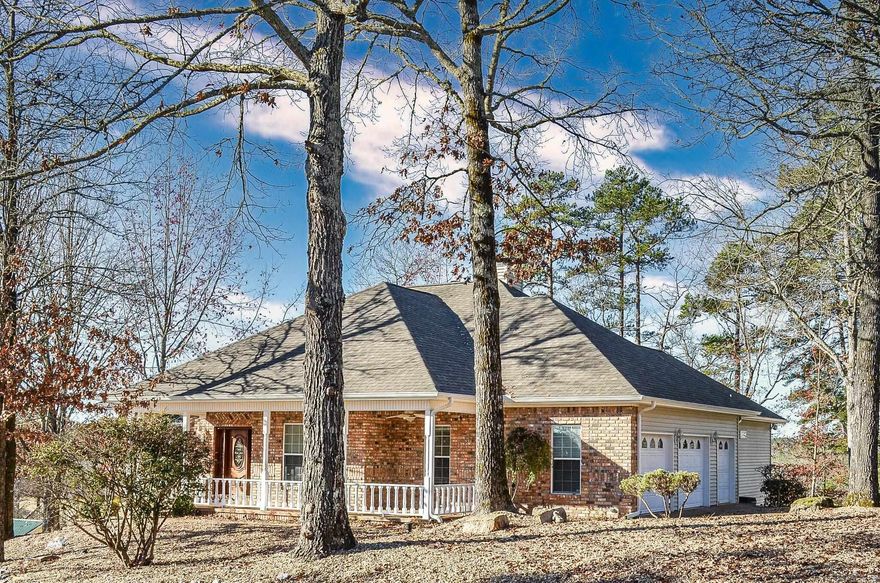 Stunning golf-front home on Magellan Golf Course, custom built by Ben White. Enjoy the beautiful course views from the expansive deck and almost every room in the house! Vaulted living room with gas-log fireplace. Updated flooring. Kitchen features granite countertops, wall oven, surface cooktop, pantry with pull-out drawers, and both eat-in kitchen and formal dining areas. Spacious primary suite offers a sitting area with french doors to access the deck, large walk-in closet, updated bath with soaking tub, dual vanities, and tiled shower. The lower level includes a kitchenette, den, bedroom, full bath, and private porch - all the perfect area for guests or entertaining. Front porch provides a relaxing spot for rocking chairs to enjoy the view from the front. Over-sized 3-car garage completes this exceptional home. AGENTS SEE REMARKS