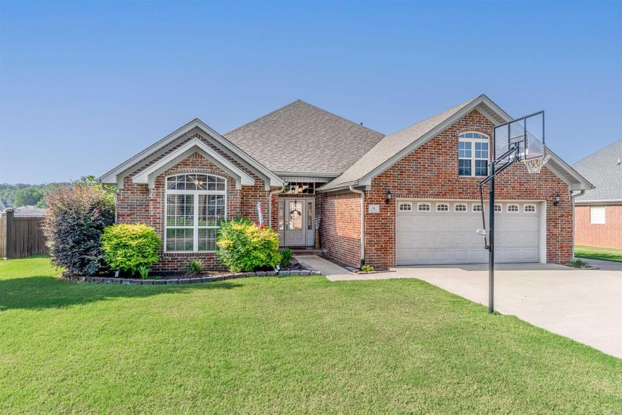 Backyard Paradise!!! This 3 Bed, 2 Bath home resides on a lakefront property in the desirable Magness Creek Subdivision. This backyard paradise includes its own dock , large yard for outdoor fun, salt water in-ground pool, hot tub, and a 14' X 14' Shop! What more could be desired? The well-maintained interior offers a spacious Primary with en suite and two walk-in closets! Large Great Room features beautiful, gas fireplace and hardwood flooring. Kitchen and Flex Room (currently used as a Dining Room) showcase large windows providing a gorgeous view of the pool and lake! Bonus: Extra parking! Plus, HVAC is Brand NEW and Newer Roof (2022). Ready to start enjoying all these amenities? Schedule a showing TODAY!