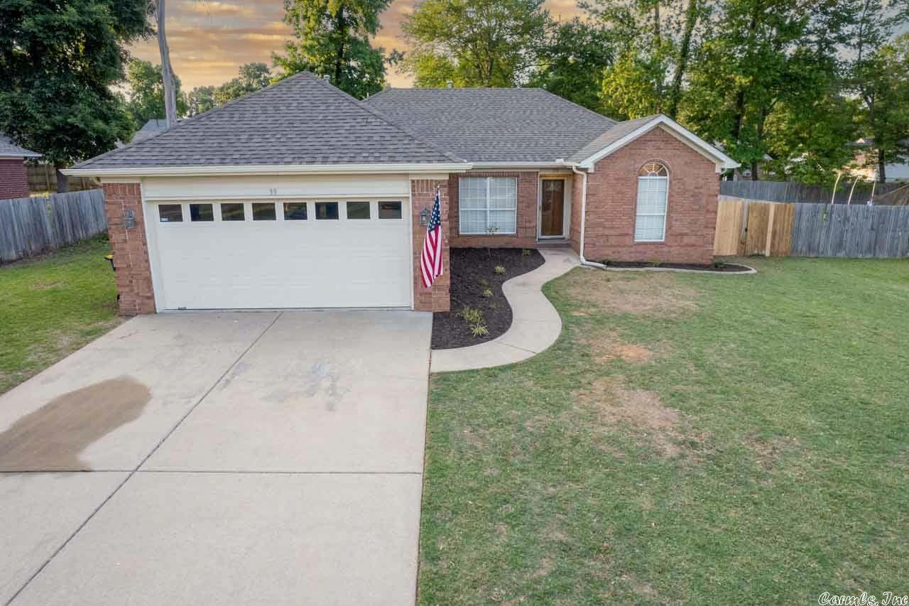 Experience the charm of this 3 bedroom, 2 bathroom home situated on a flat lot in the center of town. Recently renovated with new flooring, paint, roof, landscaping, and countertops, this home is ready for you to move in. The added security of a storm shelter in the garage provides peace of mind. The primary bedroom offers a private oasis with dual sinks and closets, separate from the other bedrooms. Backyard is full fenced. Make your appointment today!