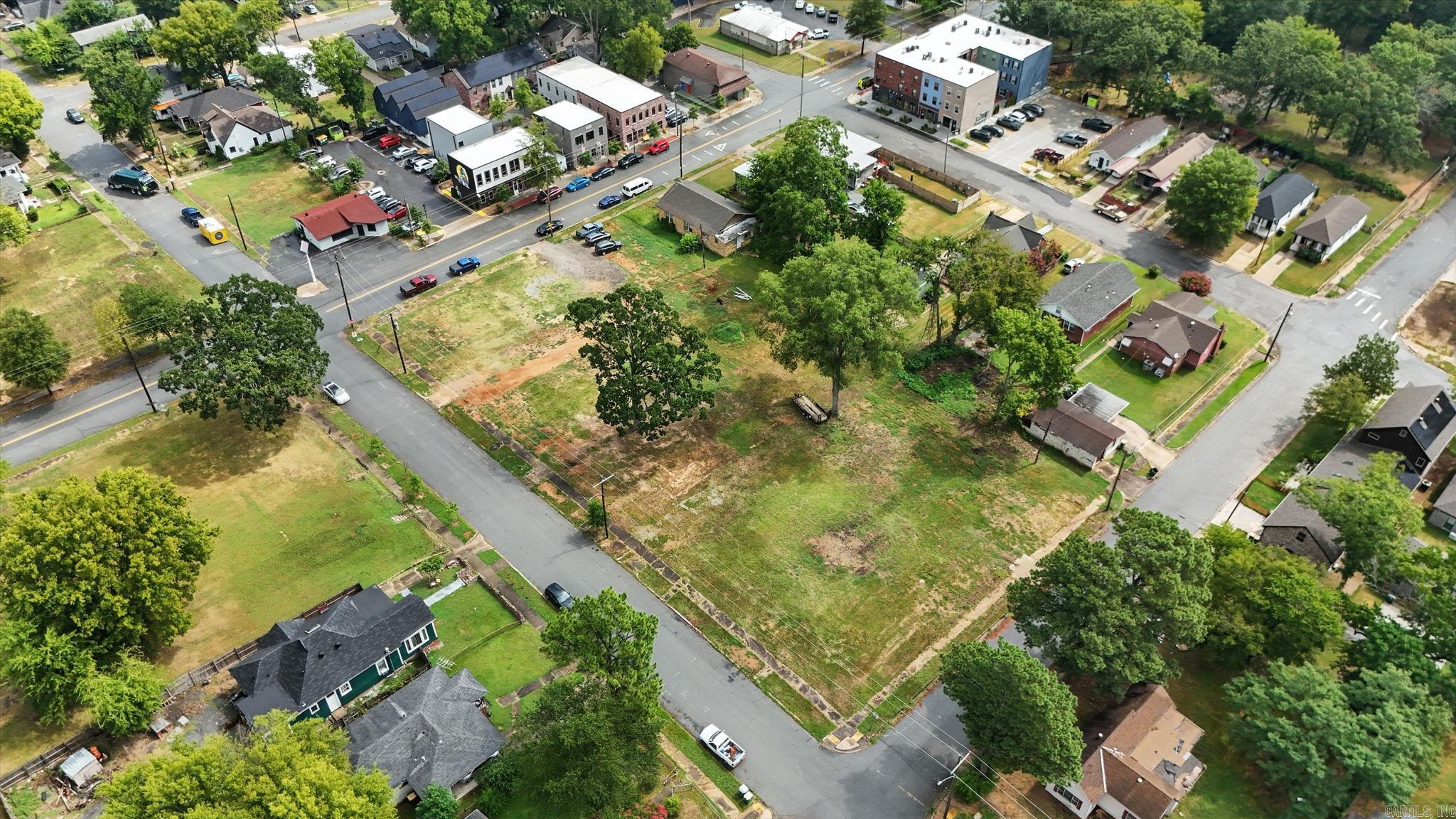 Prime development opportunity in the heart of downtown - just two blocks from Pettaway Square and about a half mile from SOMA! These two lots have been replatted for a proposed pentaplex with off-street parking. Seller has completed the replatting process, so you can jump straight into planning your build. The location offers quick access to local restaurants, shops, and entertainment, with strong rental potential in a rapidly growing area.