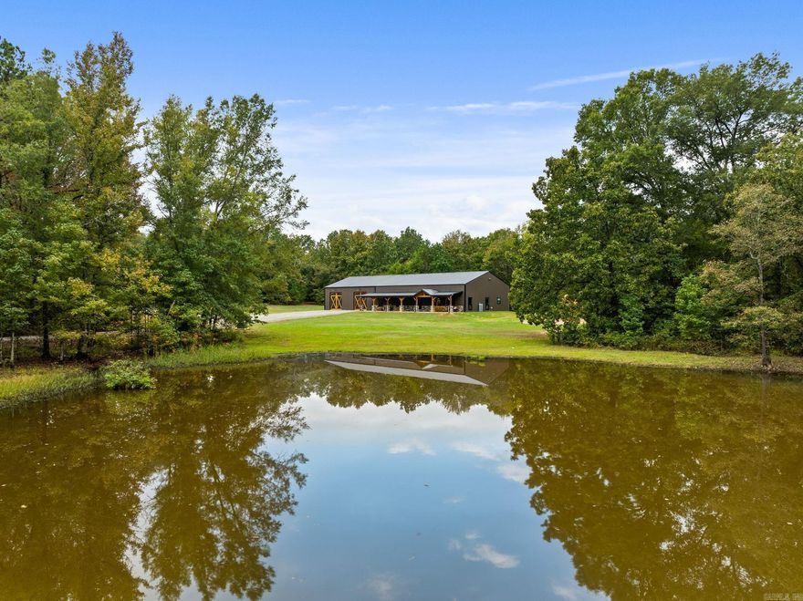 Welcome to Your Own Private Retreat — The Perfect Family Compound!  As you enter through the gates of this stunning property, you’ll immediately feel a sense of peace and possibility. The first thing you’ll notice is the charming guest cottage — ideal for visiting family, a rental opportunity, or even an Airbnb. Continue down the private drive, and nestled quietly toward the back of the property is the main residence — a beautifully designed 4,000 sq. ft. structure, featuring 2,400 sq. ft. of living space and an expansive 3-car garage/shop.  Crafted with quality and creativity in mind, this home showcases high ceilings, stained concrete floors, and a rustic, elegant design. The builder spared no detail — from the spray foam insulation for superior efficiency to the custom epoxy river kitchen island that serves as the heart of the home. The open-concept kitchen and living area flow seamlessly together, making it the perfect space for family gatherings. Picture yourself relaxing by the crackling fireplace while dinner simmers nearby — the definition of comfort and charm.