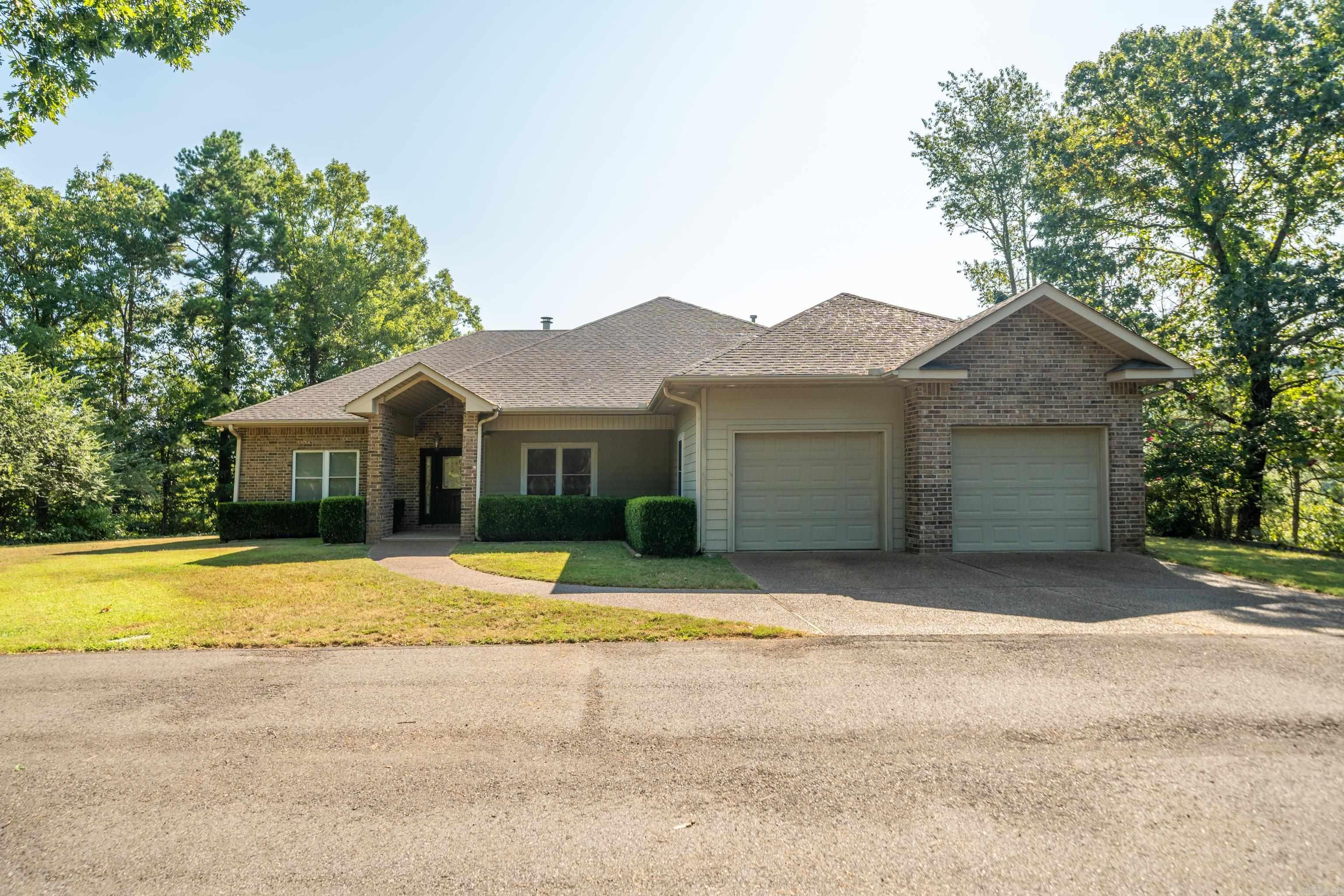 What a gorgeous unique piece of paradise! Extremely private, huge oak trees line the extended driveway as you enter through the wrought iron gate, 8x8x20 storm cellar, barn, generator, approximately 30 acres...all roving up and down the mountain. Beautiful home with amazing views. Split bedrooms for you and your guest's privacy. **Estimated taxes have Homestead credit deducted.