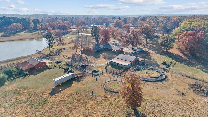 Absolutely stunning 23.4-acre property just minutes from town! This private estate features a spacious 4-bedroom, 4-bath home with incredible views throughout. The main home offers 8' ceilings in most areas, with a gorgeous den boasting 12' tongue-and-groove ceilings. A large, scenic stocked pond adds to the property’s beauty!  Equestrian enthusiasts will appreciate the impressive barn with 13 stalls, a wash rack, and a turnout pen. In addition, the property includes an approximately 1,100 sq ft studio home complete with a full kitchen, bedroom, and bath, plus an attached foaling barn—ideal for caring for and monitoring new foals.  Roofs on all three buildings are approximately 3 years old! This rare find combines convenience, privacy, and outstanding equestrian facilities in one exceptional property.  Agents see remarks.