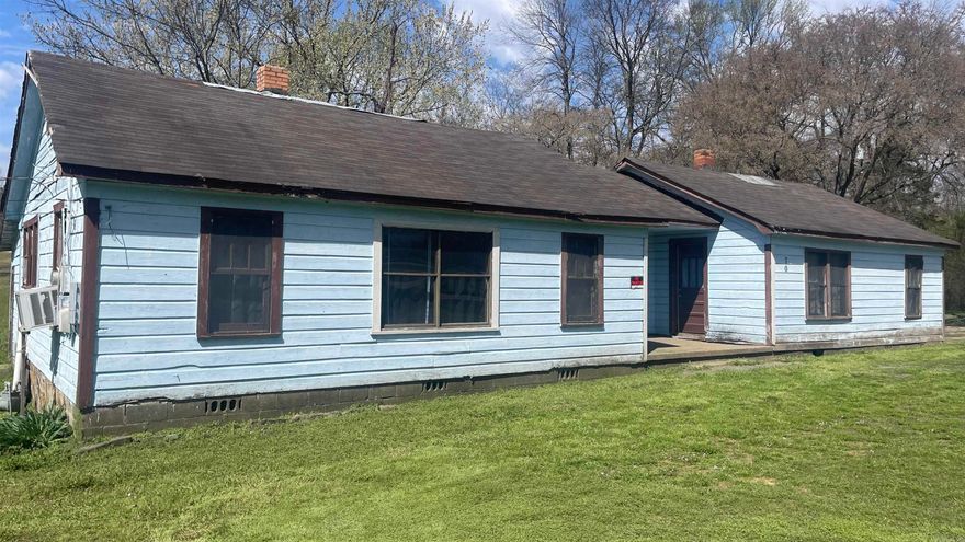 Don't miss out on this unique fixer-upper nestled on almost 5 1/2 acres! With endless potential, this property could be a fantastic investment opportunity. Conveniently located near the interstate, it offers the ideal rural setting while remaining accessible. The expansive lot provides limitless possibilities, whether you're envisioning a renovation project, space for outdoor activities, or future development. Contact the listing agent today for more information or to schedule at tour-opportunities like this are rare. *This property can only be purchased with using cash and is being sold AS IS*