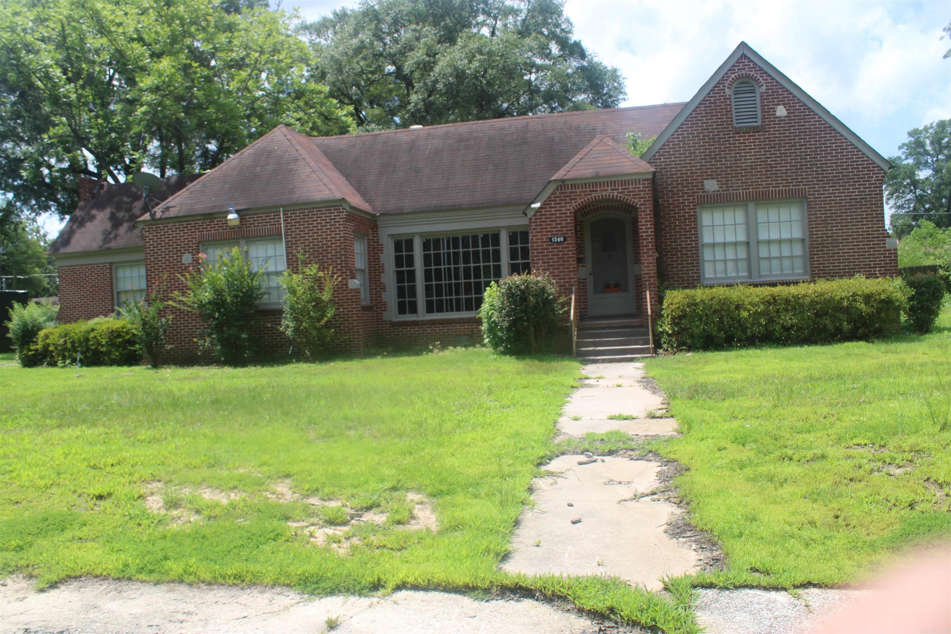 A beautiful single-family home total remodel from top to bottom, new floors, walls, the kitchen is drop dead gorgeous. The home is located at 1300 W 28th Ave in Pine Bluff, Arkansas, within the Linden Heights Addition subdivision. Built in 1949, the home offers approximately 2,541 square feet of living space, all on a single story. The structure features brick exterior walls, a composition shingle roof with gable or hip framing, and central heating and air conditioning. The home includes 3 bedrooms and 2 bathrooms, along with additional spaces such as an open porch, screened porch, and a detached garage measuring 720 square feet. There is also a concrete driveway, patio, and wood fencing on the property. The lot consists of parts of Block 5, including the west half of Lot 5 and all of Lots 6 and 7.