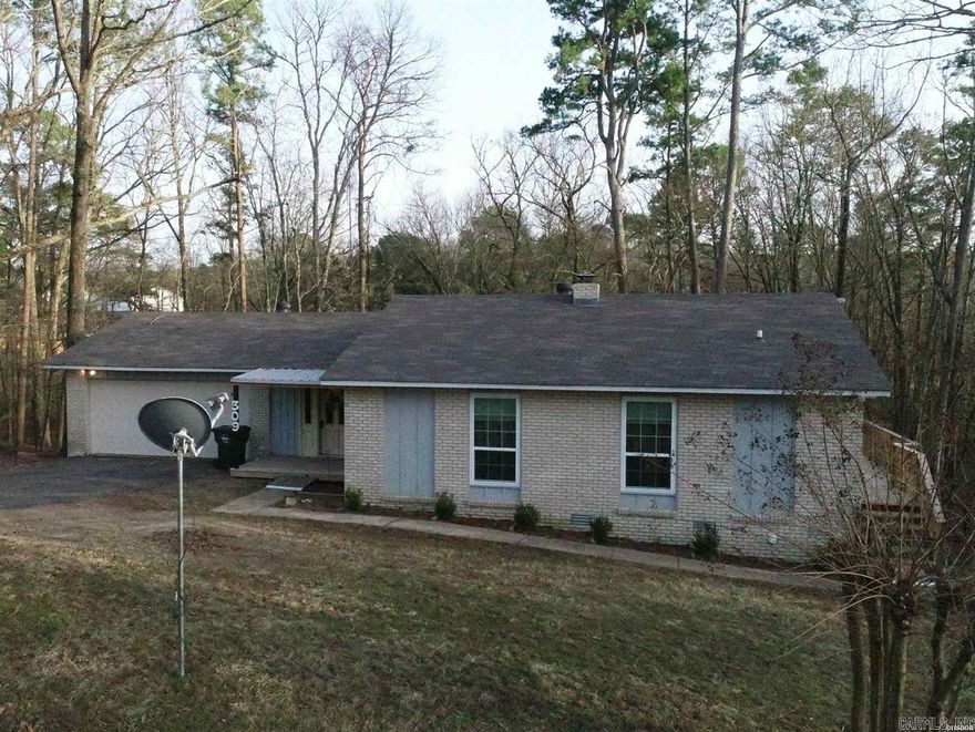 This beautifully remodeled home features a modern open-concept living area, created by removing walls for a spacious and inviting feel. The master bathroom has been thoughtfully relocated and upgraded to provide a spa-like experience, complete with a HUGE walk-in master closet. Enjoy the outdoors with the newly replaced deck, while the added fenced area provides a secure space for pets or children. With the many amenities that Diamondhead offers, this home could be a great short-term rental or serve as a private retreat.