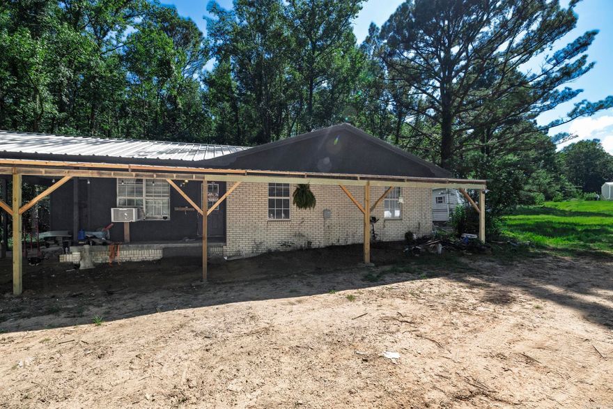 Welcome to this charming three-bedroom, two-bath home in Bismarck, Arkansas, nestled on half an acre in a peaceful, rural setting. Surrounded by Ross Foundation land, this property offers a rare sense of seclusion and natural beauty. The home has been thoughtfully updated throughout. Whether you're looking for a perfect starter home or simply craving quiet country living, this inviting space offers a great opportunity to enjoy the outdoors and escape the hustle and bustle. Don't miss your chance to own a slice of tranquility in the heart of the countryside.