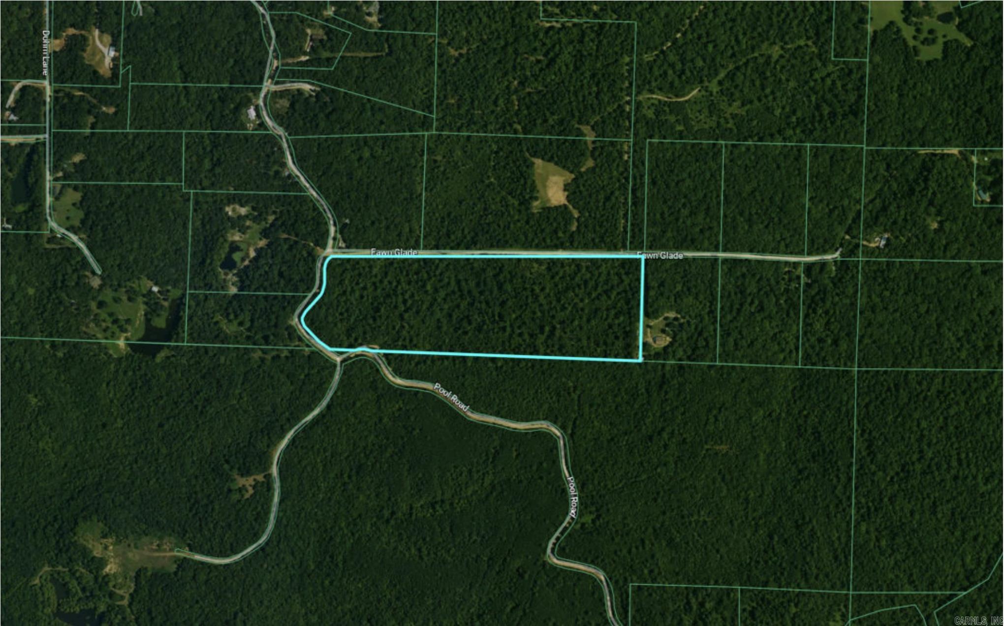 +/-29 Acres of country living! Come check out this acreage with beautiful timber and multiple building sites. Utilities (water and electricity) located down Fawn Glade for convenient access. Come check it out today. Agents please see remarks