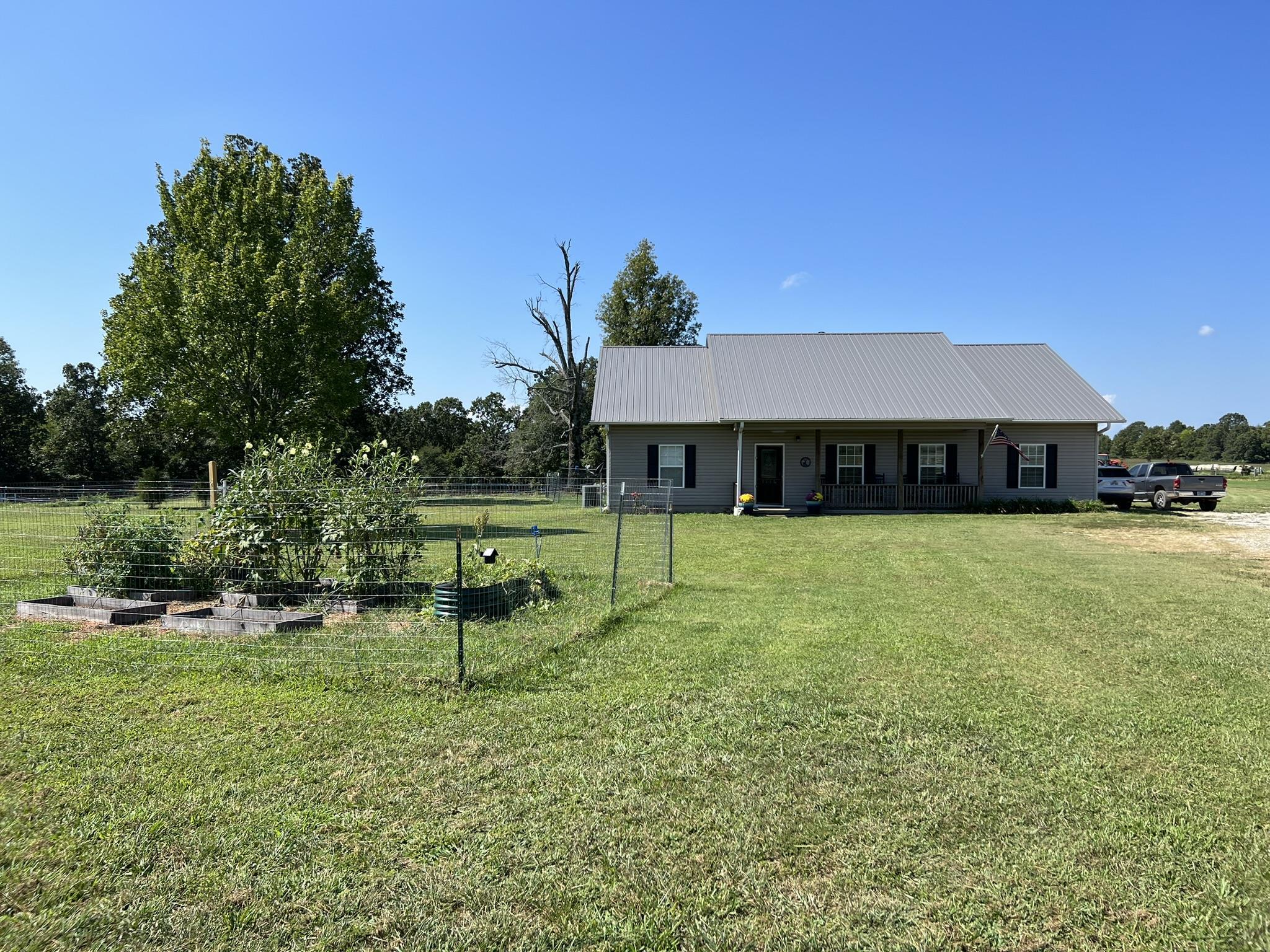 PRICE REDUCED! Absolutely Stunning Ranch Home sitting on 160 +/- acres just 6 miles out of Ash Flat, Arkansas. If you ever dreamed of owning your own ranch for horses or cattle, or a hunting lease/lodge, then look no further. Here is a turn-key ranch, fenced and cross-fenced with working pens, stables, corral, livestock barn, hay barn, on-site meat processing building with meat cooler for rendering what you grow and what you hunt, Hog pen, chicken coop/condominium, 2 stock ponds and 1 large, stocked pond. Shooting stands and box stands for hunting deer and turkey and other wildlife. The Ranch style home is 3 bedrooms and 2 bathrooms. Gorgeous master bath and walk in closet. Beautifully designed kitchen and dining area with a mostly open floor plan. 1 bedroom is presently being used as an office. Breathtaking views from many locations on this wonderful property, including the covered back deck. Just imagine sitting on the back deck and enjoying beautiful sunsets every evening while still being able to keep tabs on your horses and livestock. Make your appointment to come and see this little slice of Heaven on Earth. Watch virtual tour