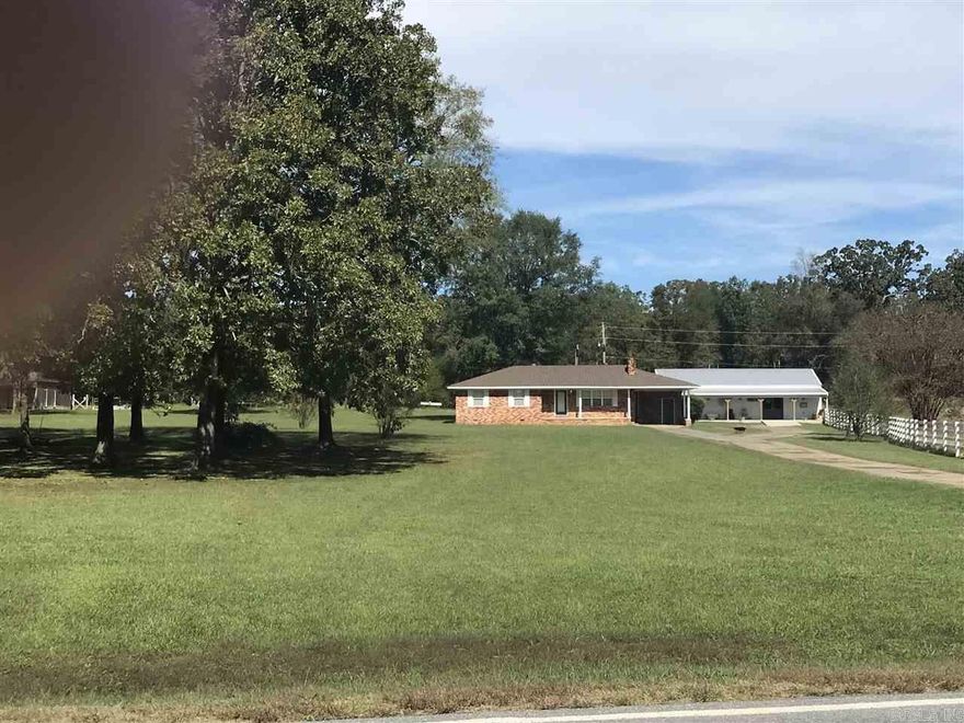 Updated 3bdrm 1&1/2bath home!  Sets on 2 acres.  City water and First Electric All original hardwood floors!  Tile in kitchen and baths. Has stove with oven, dishwasher, microwave & frig.  Big Laundry room with washer/dryer hookups. Wood burning fireplace!  Owner keeps yard mowed!  Must fill out application and be approved to rent!