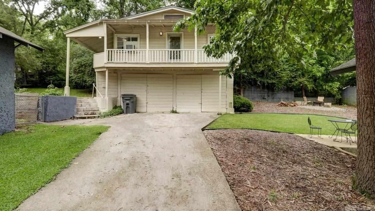 Invest in your future with this affordable Hot Springs property, perfect for either a VRBO rental or a budget-friendly home. Located in an opportunity zone near downtown, this cozy retreat is fully furnished and ready to generate nightly rental income.