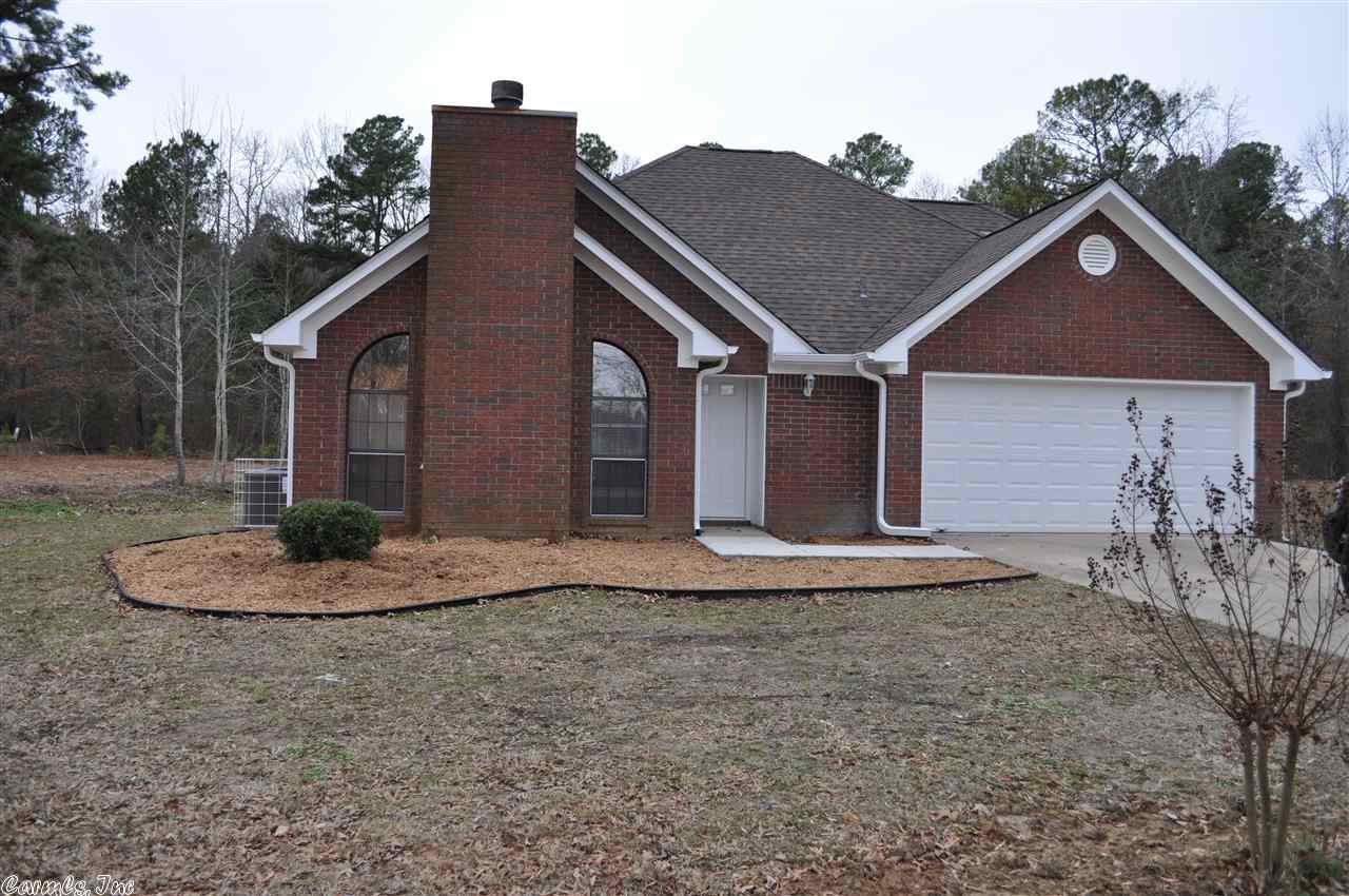 Everything is nice and new! Fireplace in living room, new flooring and paint throughout. New roof, new heat & air. Master bedroom is downstairs with master bath having separate tub and shower. Three bedrooms upstairs. Great kitchen with all new appliances, custom built cabinets and granite counter tops. Large patio. Sitting on 2 acres with 2 more available.