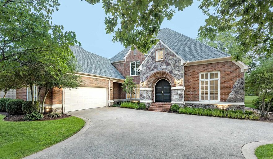 This stunning home in the sought-after Avignon neighborhood offers a rare opportunity to enjoy modern luxury with a golf course view. From the moment you step through the beautiful arched entrance with oversized double doors, you’re greeted by a grand stairwell that sets the tone for the elegance found throughout. The main level features a spacious office and a living room with vaulted ceilings and large windows overlooking beautiful views of the golf course. A half bath is conveniently located on the main floor, and the entire home showcases new windows, updated flooring, designer-selected light fixtures plus a new roof.  The gourmet kitchen is a showpiece, featuring white cabinetry, waterfall countertops, new appliances, a large pantry, and a breakfast area that flows into a bright sunroom. There’s also a separate bar area for effortless entertaining.  The primary suite is a private retreat with a spa-like bathroom that boasts a gorgeous walk-in shower, a soaking tub, split vanities, and a huge walk-in closet. With expansive views of the golf course from the living areas, this home combines elegance, comfort, and location in a way that’s truly unmatched.