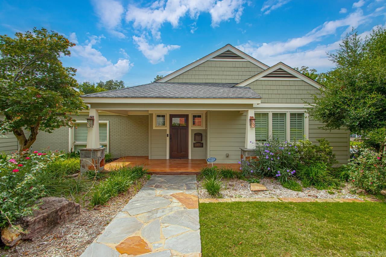 This unique Heights home is located on an oversized corner lot with a garage! Rare find for the area. It offers perfect family living on one level with a spacious split floor plan. The large primary suite features a walk-in closet & freshly remodeled bath. Natural light fills this wonderful home throughout. Enjoy entertaining on the large deck, gathering family around the table in the perfect dining nook, and cooking in the renovated kitchen. Home has high end details like plantation shutters, custom window coverings and wallpaper in living room, and beautiful light fixtures throughout. Convenient to shopping, dining & downtown areas. Beautiful landscaping. Room to expand, too! Agents see important remarks