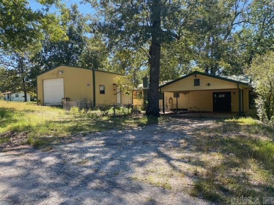 Location, Location, Location…. This home is located minutes from the Bull Shoals Lake and the White River! Sitting on a corner lot with an attached carport and a detached shop. Better call today!