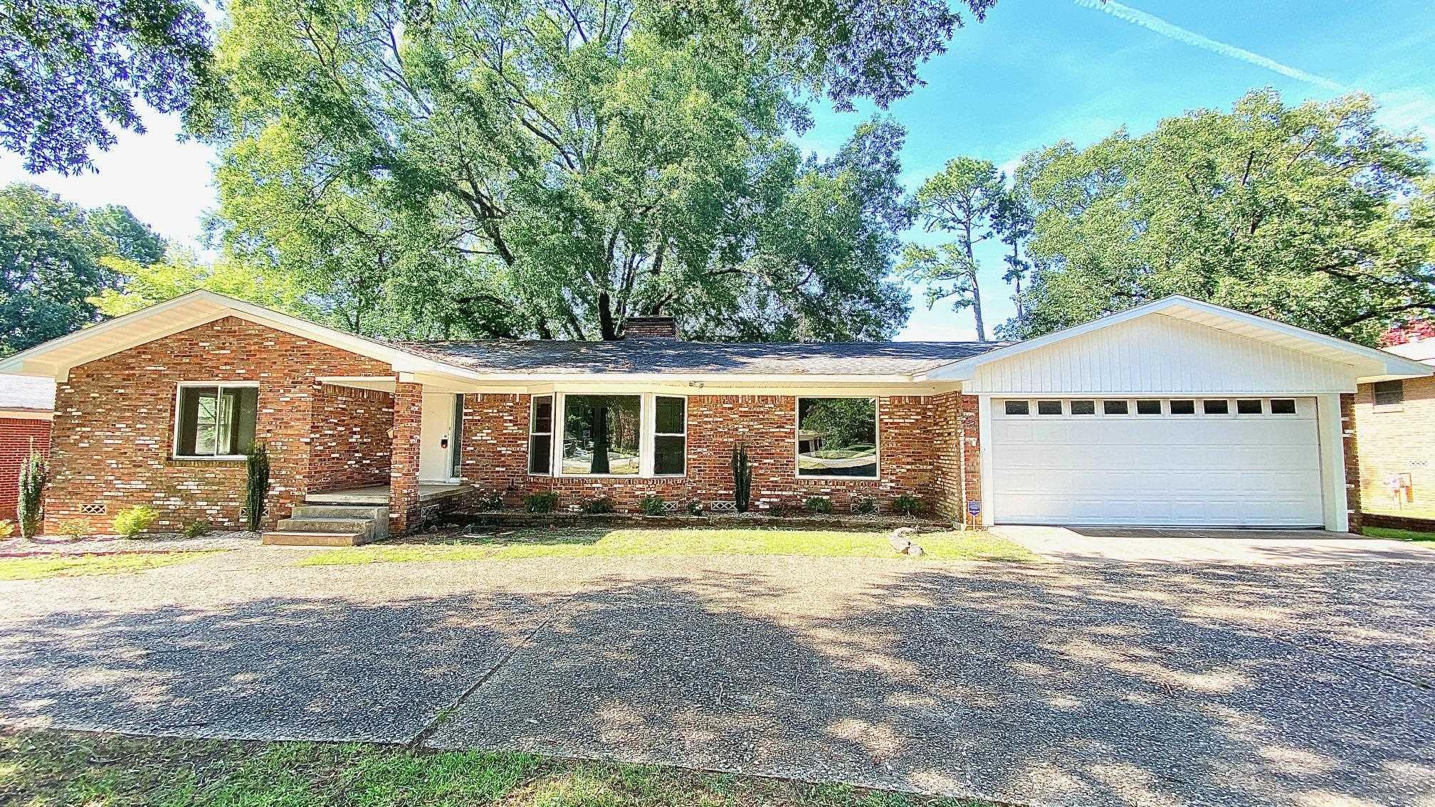 Exceptional 4-bedroom, 3.5-bathroom home located in the heart of Little Rock. Situated on a half-acre lot, this stately home has undergone a complete transformation, offering a perfect blend of classic charm & modern elegance. You'll be impressed by the refinished hardwood floors, paired with new windows that fill the space w/ natural light. The expansive family room greets you w/ its picture windows, elegant fireplace, & custom-built shelves. The updated kitchen boasts exquisite granite countertops, all-new appliances & a convenient breakfast bar. Right off the kitchen, youāll find a cozy hearth room perfect for relaxing by the fire. A pantry, storage room, half bath, laundry room & office add to the convenience of this well-designed floor plan. The primary bed is a true retreat, w/ gorgeous hardwoods & 3 closets. Primary bath features double vanity & stunning tiled walk-in shower. Main level youāll find 2 more spacious bedrooms & a beautifully updated bathroom. Lower level offers incredible flexibilityāideal as an in-law suite or teen quarters with a bedroom, bath, bonus room & extra storage. Step outside & enjoy the tranquility of your all-brick patio. Home has so much more!