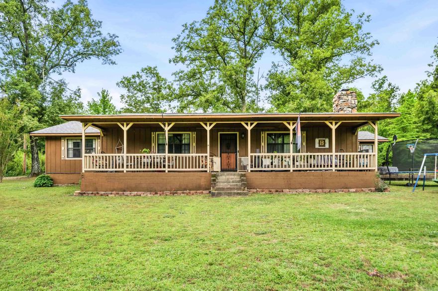 Situated on 9.45 peaceful acres, this spacious 3 bedroom, 2 bath home offers the perfect blend of comfort, privacy, and country living. With plenty of room for raising chickens, small farm animals, gardening, or simply enjoying the outdoors, this property gives you the space and freedom to make it your own.  Inside, you will find 2,278 square feet featuring a large primary suite, sunroom/den, and a stunning living room with wood-beamed ceilings and an impressive floor-to-ceiling stone wall complete with a Buck Stove insert wood-burning stove. Fresh paint has been applied to the living room, all bedrooms, and hallway. New hot water heater was installed in 2024. Fiber internet has been ran to the home, allowing you to enjoy country living without sacrificing modern convenience.  Step outside to the welcoming front porch, scenic surroundings, and a shed/shop with a concrete floor that offers space for tools, equipment, and extra storage. If you've been dreaming of quiet country living with acreage and charm, this property is a must-see! See Agent Remarks.