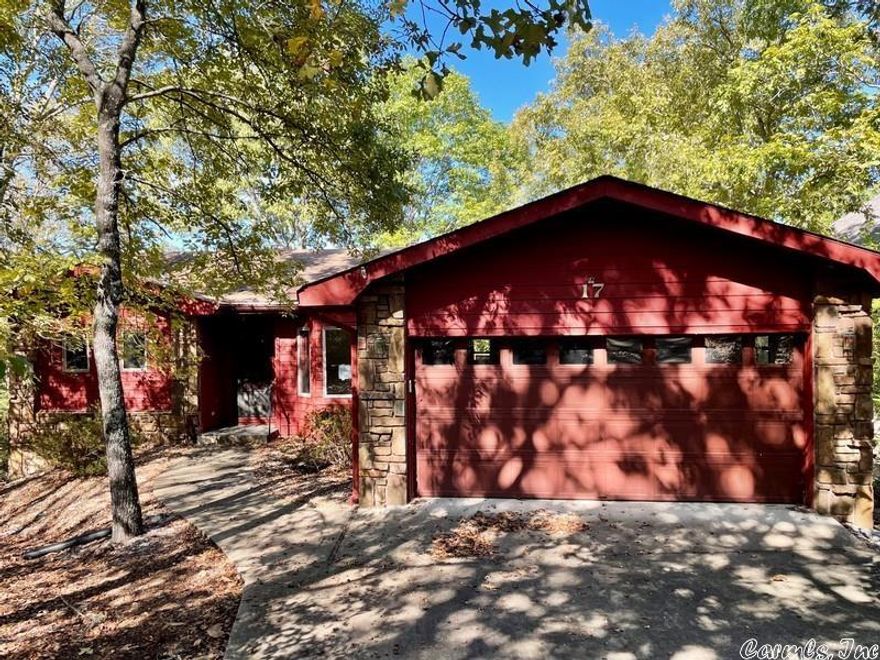 Charming one level frame traditional style home on the lake in the gated community of Hot Springs Village. Home features one bedroom, one full bathroom, one partial bathroom, central heat, central air, fireplace, attached 2 car garage, porch, deck, partial finished basement with 2 bedroom, 1 full bathroom and two small bonus rooms. HUD Case #031-409888, FHA Financing: IE (Insured Escrow), Property is sold in as-is condition, no warranties, guarantees or representations.