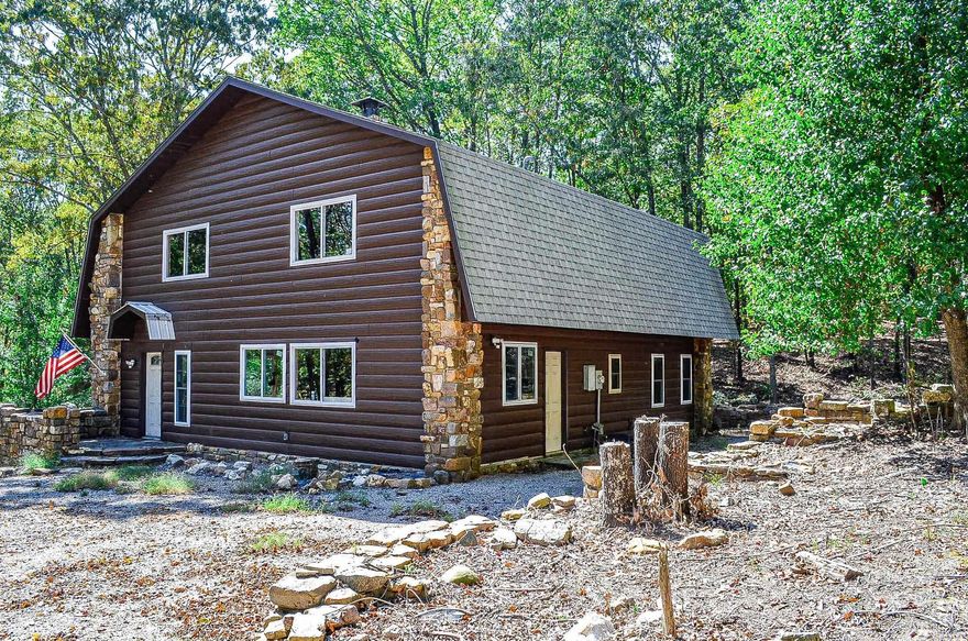 Unique opportunity......large parcel of land (7.96 acres) with 2 level 2592 square foot "shell" of a home. Potential 5 bedroom 2 bath home plus out-building and pond. Level entrance with circle drive. The interior of this home is ready for finish out. Drywall and flooring is needed. No appliances are installed. Stone fireplace with wood burning insert. All new exterior metal siding, new windows and patio doors.   Some electrical is in, upper level bath is plumbed in, second floor deck off bedrooms is completed. Some lighting fixtures are installed. Property is being sold"AS IS WITH ALL FAULTS". Seller will make NO repairs. NO property disclosure available.