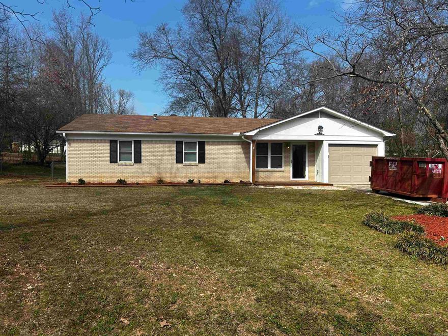 Here is your chance to own a well maintained home with tons of curb appeal in the tranquil Pebble Lake subdivision of Benton. The 3 bed/ 2 bath house sits on an almost half acre sized lot with fully fenced in backyard, complete with storage building for whatever you need to store. Brand new gas range, microwave, and dishwasher convey with property, as well as fridge. Laminate flooring in every room throughout house except where there is tile (laundry room, primary bathroom, pantry) and carpet (two guest bedrooms). Seller will be having two guest bedrooms recarpeted before close. Deck/ porch areas have been freshly painted, water heater was replaced in 2024, and roof was replaced in 2016. A heated one car garage is perfect for storing a car, boat, ATVs, or would make a perfect home gym or studio. Was most recently used as home gym. Bryant school bus stops a couple hundred yards down every morning and afternoon!