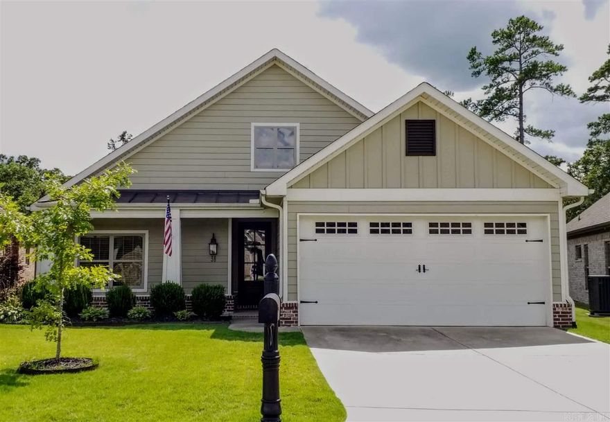 Quality one level craftsman custom built in 2015. Open floor plan features hardwood flooring, 12 ft ceiling in great room, stacked stone gas fireplace & built-in bookcase. You’ll love the counter space the huge island offers! Stainless appliances, gas cooktop, and pantry.  Master suite offers his/her closets and marble countertops. One of the 2 additional bedrooms in this split floor plan features tile flooring & patio access. Partially covered patio w/gas hook up. Fully fenced yard backs to greenspace!