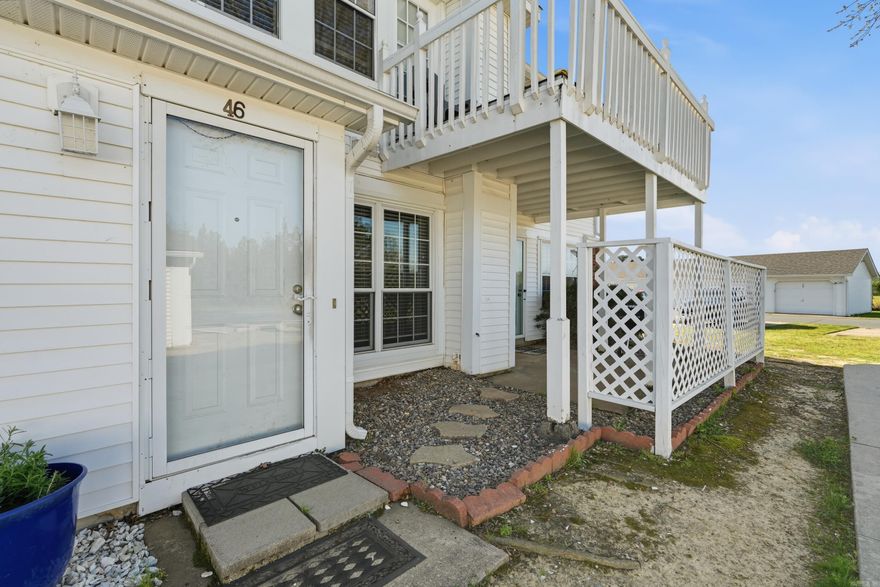 Cute & Move-In Ready Condo in Carriage Courts! Bottom-floor unit with easy access and a functional layout. The living room features a cozy fireplace with built-ins and an office nook just off the main space—perfect for working from home. Kitchen includes stainless appliances, updated backsplash, and ample cabinetry. Spacious bedrooms with great natural light, plus a bathroom with double vanity. Enjoy direct outdoor access, two nearby parking spots, and a newer HVAC. Community pool and gazebo included. Call to see it today!