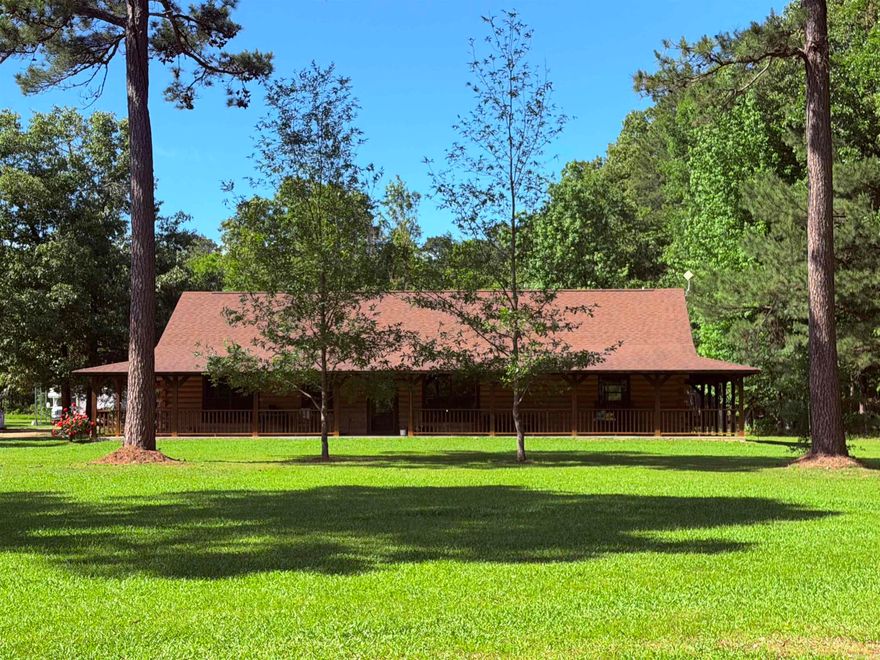 WELCOME HOME! This Beautiful Custom Build Log Cabin Is Stunning! Full Wrap Around Porch, Country Living Close To 530, Large Master Suite, Split Floor Plan, Walk In Closets, Custom Cabinets, His & Hers Closets, Walk In Shower, Jacuzzi Tub, Inclosed Storage Room, Insulated 24X30 Shop With 2 Liens On Each Side. Huge Back & Front Yards With Lots Of Privacy, Mud Room/ Laundry Room & So Much More!