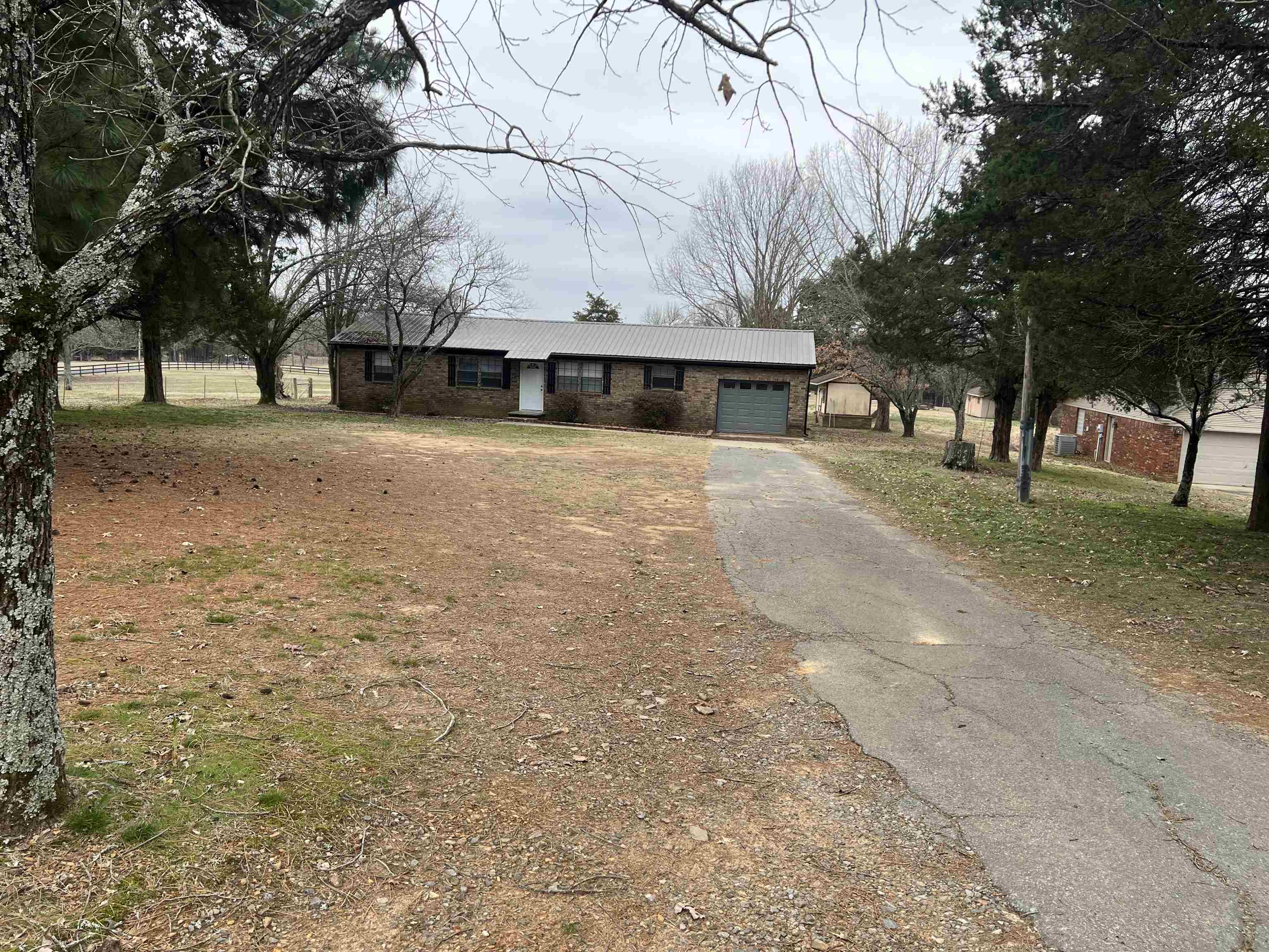 This charming 4-bedroom 2 bath home features original hardwood floors full of character and charm. Some updates have been completed and it's ready for your personal touch! Enjoy the large, shaded yard, and nice covered deck perfect for swing sets and outdoor fun or relaxing in a peaceful area! AGENTS SEE REMARKS SCHEDULE SHOWING WITH SHOWING TIME.