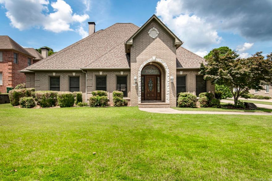 Welcome to this beautifully maintained one-level brick home nestled in the sought-after gated community of Hickory Pointe. Boasting a spacious and functional layout, the main residence offers three bedrooms, two and a half baths, and an open floor plan ideal for both everyday living and entertaining. Inside, you’ll find hardwood floors, carpeted bedrooms, and generously sized walk-in closets. The open-concept kitchen flows seamlessly into the main living areas, while a dedicated home office area and laundry room with a convenient half bath add to the home's versatility. Step outside to a stamped concrete breezeway/carport, which connects the main house to an impressive 30’ x 70’ heated and cooled garage—a true standout feature. This expansive space includes an office area with plumbing for a bathroom and ample storage, offering endless possibilities for work, hobbies, or future conversion. Set on a 90' x 213’ lot, the property also includes extra gated parking and a beautifully landscaped lawn, perfect for pets, play, or gardening. With its unique features and incredible potential, this property is a rare find—offered at a very reasonable price. Don’t miss the opportunity.