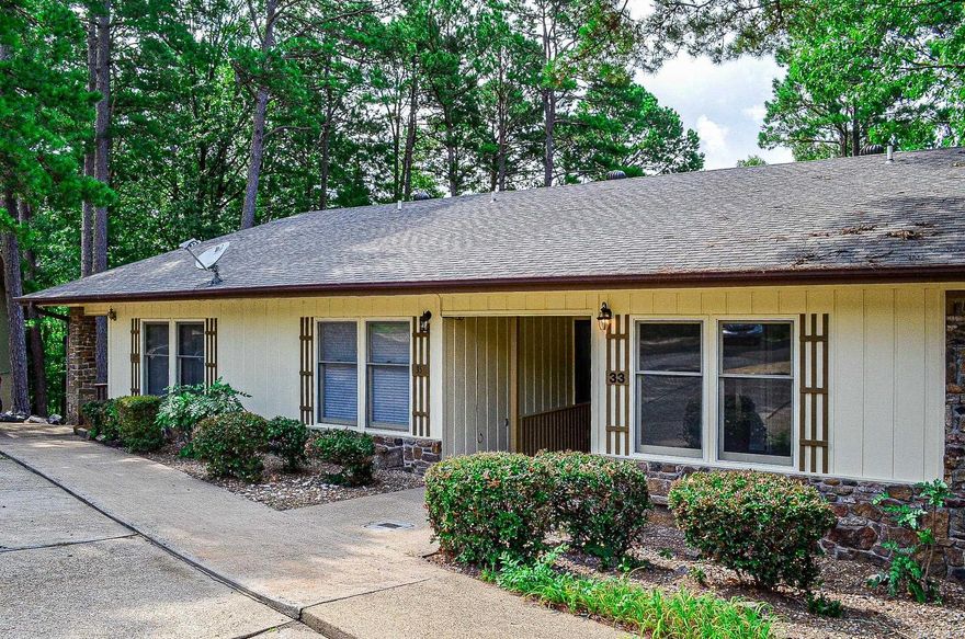 This completely remodeled End-Unit townhome features three bedrooms plus an additional room that might be used as an office, TV room, craft room or exercise room. Plenty of windows to look out at nature & trees.  Everything has just been finished or updated!  new Roof, new HVAC system, new wood deck, new plumbing & electrical, new LVP flooring, new appliances, new cabinets, quartz countertops, and tastefully added backsplash.  The entire inside has been freshly painted with stylish colors.  The only thing left to be done at this beauty is to place your furniture & move-in!   The layout includes one bedroom on the main level with full bath, kitchen, and living/dining combo.  Downstairs you will find another bedroom, another full bathroom with tub/shower combo, the laundry room with washer & dryer, the third bedroom and the bonus room. Note: the new bonus rm is 12 x 13.5sq ft and is now added to the original sq footage.  These townhomes are not far to the west gate, where you will find various shopping, restaurants and businesses.  This place would a nice rental also.  Close by Lake Desoto & DeSoto golf course, Pickleball Courts, Outdooe Community pool. To see this gem, contact us.