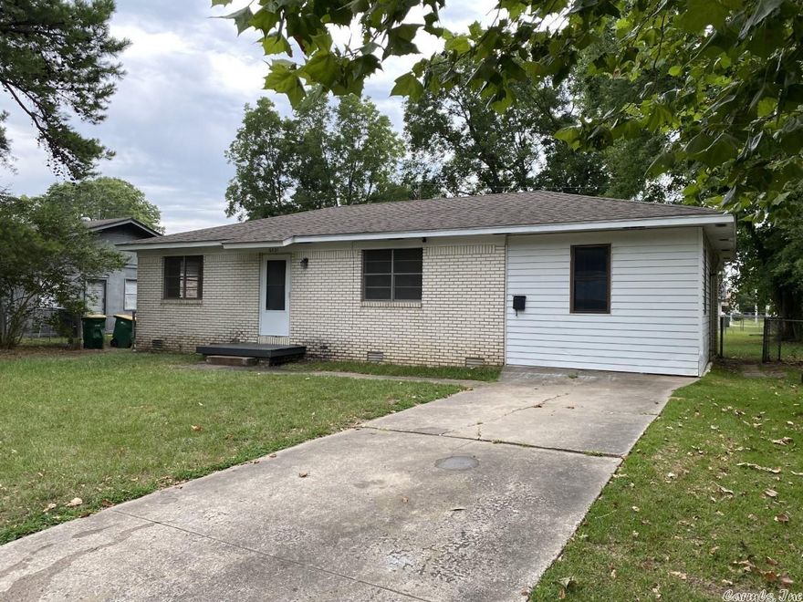 Adorable 3 or 4 BR, 2BA home. Totally redone, fresh paint inside/out. New laminate floor & carpet. Living area offers beautiful crown molding. Eat-in kitchen has tile counters, pantry/laundry. Roof replaced 7 yrs ago. Carport was enclosed made into master BR w/full BA, or could be a family room or game room. You won't want to miss the newly updated home ready for a family!