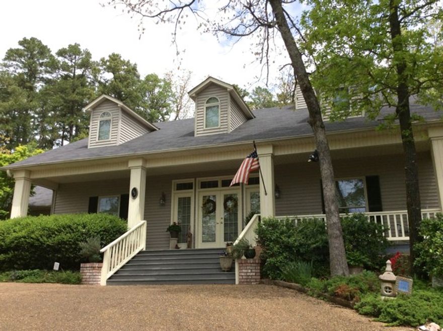 Southern Charmer overlooking Beautiful Lake Balboa from the front porch! Open Floor plan with beautiful moldings and vaulted living area! Formal dining room with built-ins, access to covered patio garden area from living, master, and guest room! Spacious storage room in the garage and golf cart or workshop area as well! Immaculate landscape with blooms in multiple seasons! Desirable East End location and move in ready! Seller offering one year home warranty! Call today for your private tour!