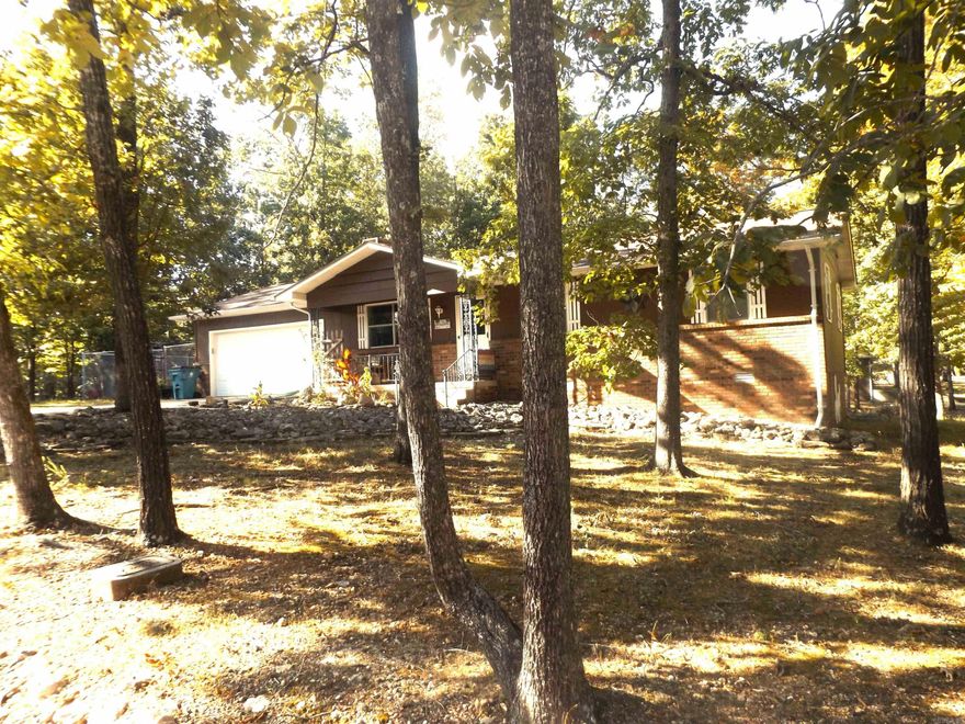 This amazing 3-bed/2-bath home recently underwent an incredible remodel! Featuring solid white oak wood flooring throughout the home. All new custom white oak cabinetry in the kitchen, along with new countertops and appliances. The guest bathroom received a new porcelain tile floor, and the master bath was totally remodeled! There is an all-seasons sunroom and a screened-in porch to enjoy your backyard. For the gardener in your family, a fenced-in raised garden area. For the craftsman, a built-in workshop in the garage! If that is not enough, the home is located just minutes from the marina! This makes the perfect move-in-ready retirement home!