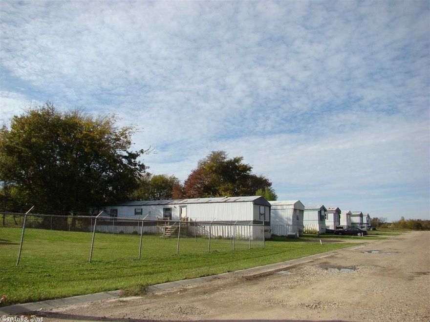 Looking for a sound investment?  How about a mobile home park with plenty of room to grow?  This 19+ acre mobile home park with currently 11 mobile homes and twelve spaces may just be what you have been searching.  Laid out into three phases, this park is ready for you to take it to the next level - With an immediate return on your investment and with the future plans already laid out for you the possibilities are endless