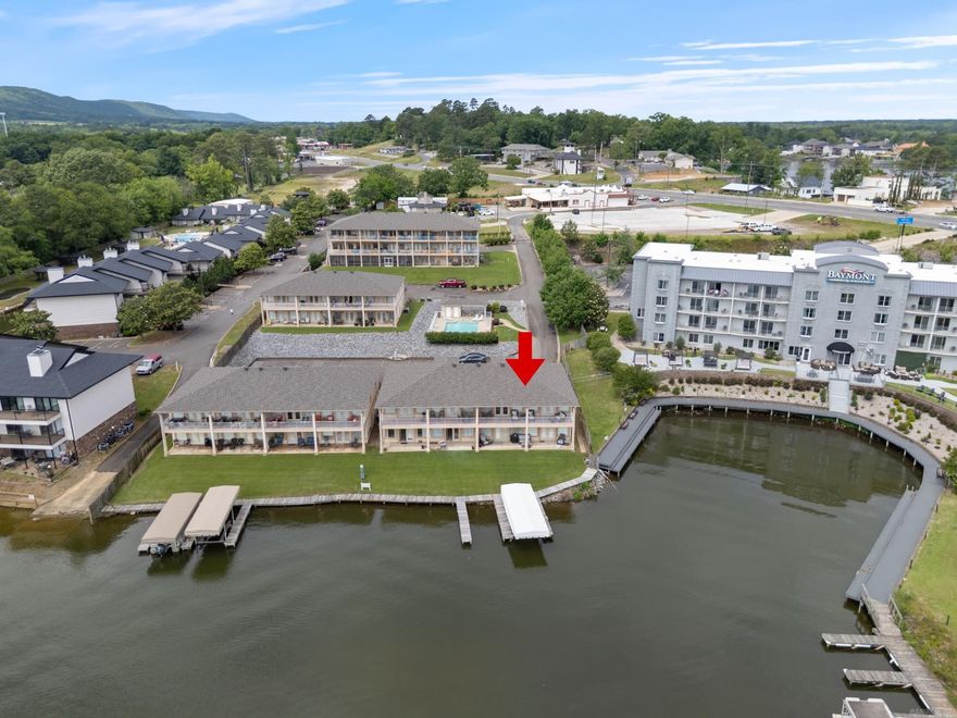 Lakefront living at its finest! This fully furnished 2 bed, 2 bath condo in Hot Springs offers an open floorplan and a spacious deck with stunning views of Lake Hamilton. Located in a gated community with a pool just steps away, it's the perfect spot for relaxing or entertaining. Right in the heart of all the action—and short-term rental approved—this turnkey property is ideal as a vacation home, investment, or both!