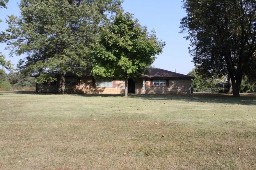 This property is a charming home on a secluded shaded lot. The cozy family room features neutral carpeting with plenty of space for furniture. The eat-in kitchen offers abundant cabinetry, a breakfast bar and updated appliances. A second living area sits right off the kitchen with a wood-burning stove. The master suite features a dual vanity and a tiled tub/shower combo. Other amenities of this home include a two car garage, a 50 foot by 50 foot workshop and a laundry room.