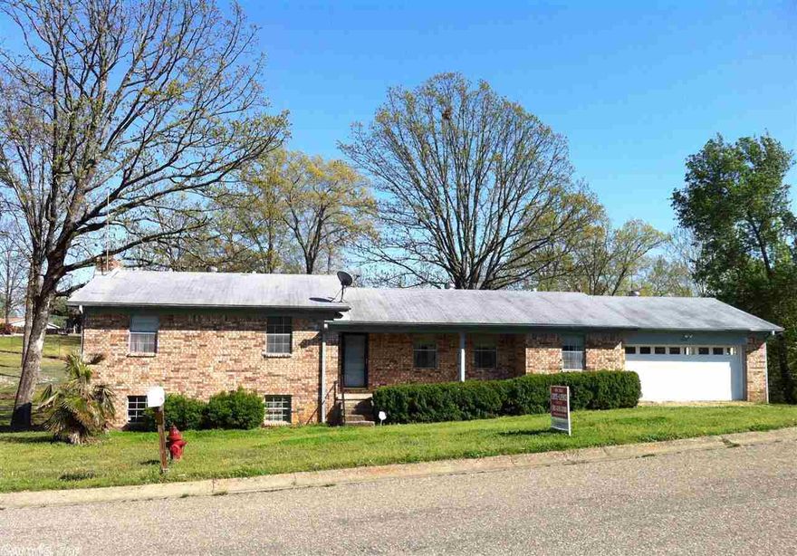 Lots of room here! Large tri-level home includes 3 large living areas, sep dining, huge den with rock f/place downstairs also has full bath plus bedroom sized closet maybe 4th bedroom? Garage with extra storage and new door in 2012. Rear access to walk-in crawlspace for storage or shop type uses. NEW zoned HEAT & A/C, DUCTWORK IN 2012 is a valuable update! It's all brick with wood trim, large backyard is fenced complete & the subdivision is quality, great looking, well maintained area. Come take a look!