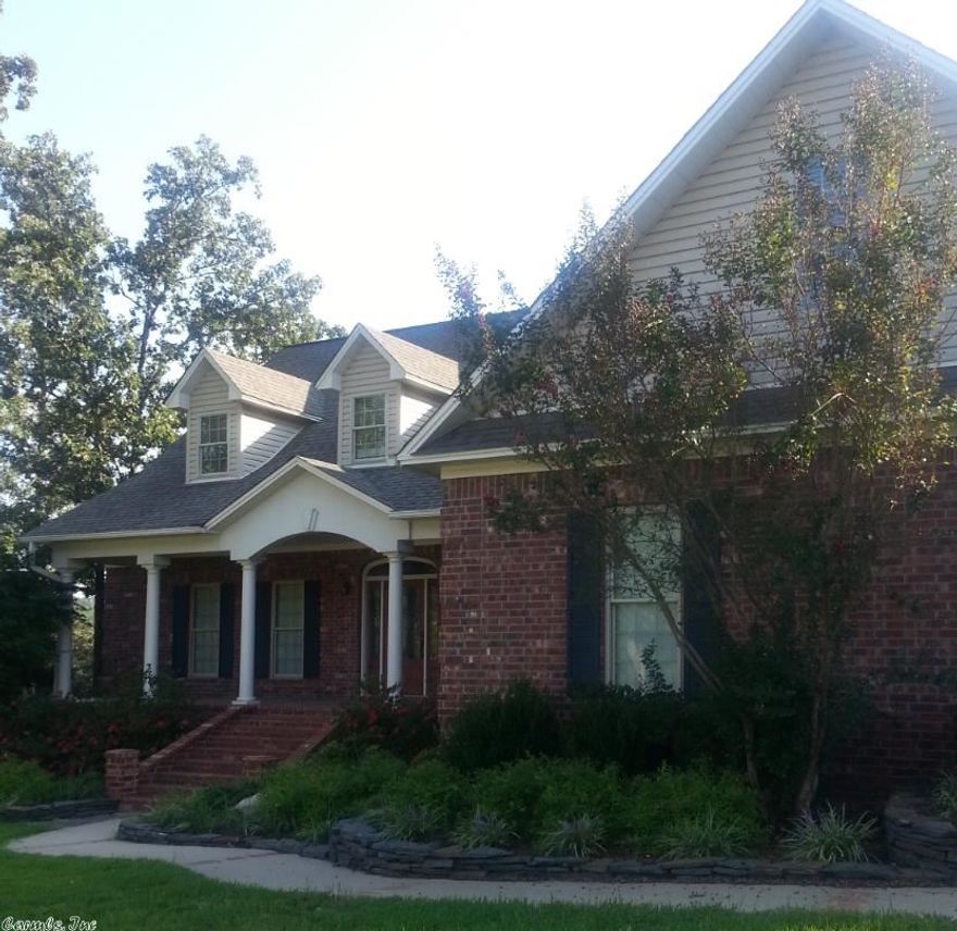 This is a lovely home in the beautiful Club West Estates that comes with a 1 year home warranty.  There is plenty of room inside with two master suites, a beautiful kitchen with granite counters, a warm and inviting living room with a fireplace and built in book shelves.  Upstairs has plenty of extra space with a huge office (could be 5th bedroom with a huge walk in closet), and a den.  You can relax in the sunroom or on the deck!  There are just way too many features to list, call for your viewing today!