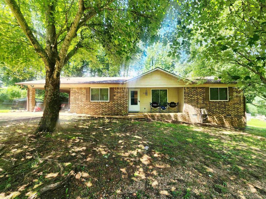 Charming home in Magnet Cove. Master bedroom is separate from other 2 bedrooms with large closet and full bathroom. The open living and kitchen space is perfect! Walk out the back door to nice fenced in backyard and deck space for outdoor living. This home offers many upgrades. Dirt work for huge shop has already been done. Nice low traffic street. Call me or your agent for showing.