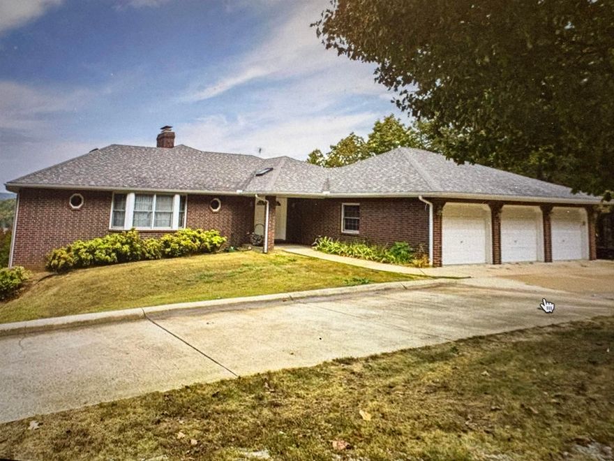 All brick 3 bedroom 3.5 bath home situated on 2.5 acres m/l on Bull Shoals Lake. This home also has a fully finished basement.