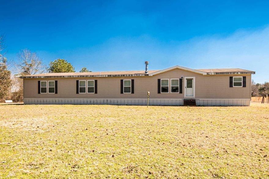 Spacious 4-bed, 3-bath 2017-built mobile home on 10 private acres. This well-maintained home offers an open layout with plenty of room to relax and entertain.  Enjoy summer days by the in-ground pool and peace of mind with a whole-home generator. Surrounded by nature, this property provides privacy while still being conveniently located.