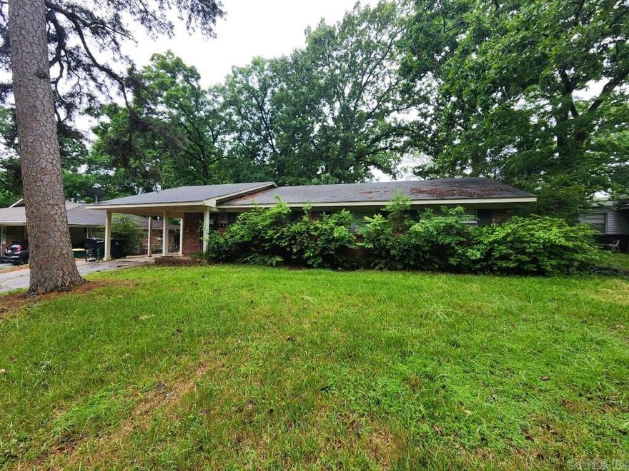 Welcome to 104 Hiawatha in Little Rock's Mid-Towne area in the Markham Manor subdivision.  Convenient location, close to everything. Antique brick home previously remodeled, but needs some attention.  New roof 2014. Master bath with oversized walk-in shower and hall bath all new tile. Updated fixtures. 1 car carport with extra concrete drive and extra parking pad. Exterior storage shed.  See agent and showing remarks