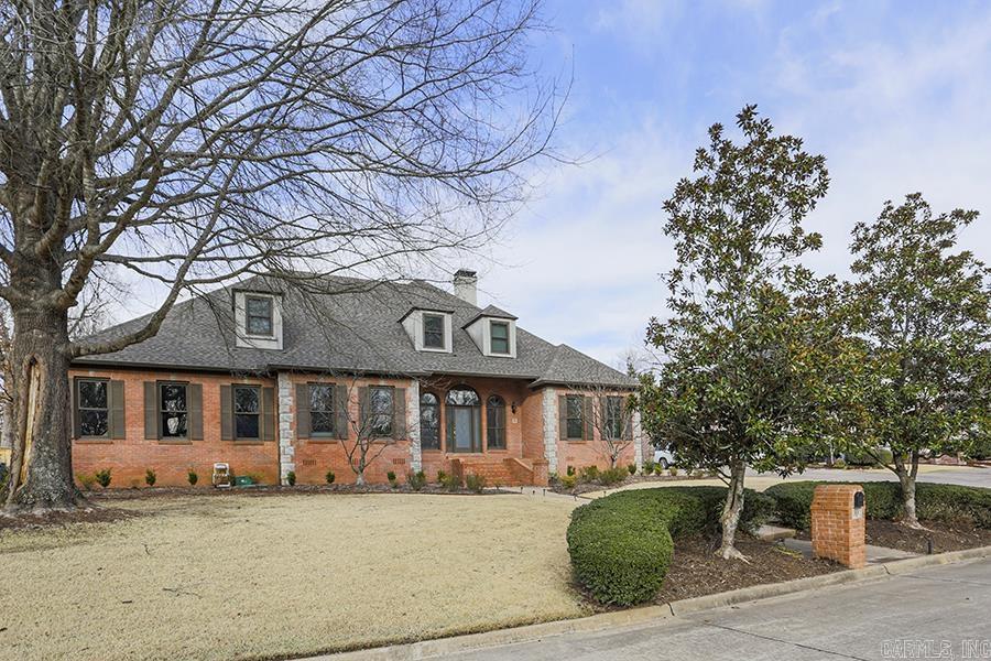 Wonderful opportunity to own this beautiful home on the prestigious Bretagne Cir. in Chenal Valley. Lives like a 1 level w primary & 2 other BRs down plus a large bedroom, bath & gameroom or 5th BR up as well as a landing w built-in desks. Spacious open floorplan centered around a greatroom w stately fireplace & bookshelves, large study or den, separate dining plus informal area off kit/breakfast bar. Split BRs w primary BR on 1 side & kids/guest rooms on the other. Huge new concrete patio has pergola w retractable sun shades. Fantastic outdoor entertaining options w large level fenced yard, covered seating, dining & cooking areas, etc. Side loading 2 car garage plus extra parking pads. Site laid hardwood flooring, granite counters, recent updates all make this a fantastic home at an attractive price!