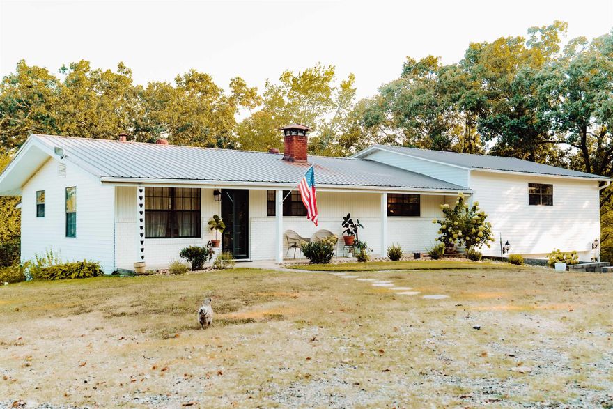 Beautiful home on 15 acres and just 15 minutes from the heart of Downtown Benton! Interior has been completely renovated.  Large bedrooms, cozy family room and an oversized garage.  Property has a 30x50 pole barn, fenced in garden, chicken coop an 3/4 acre stocked pond.  10 mile creek runs through the back side of the property and includes private access.