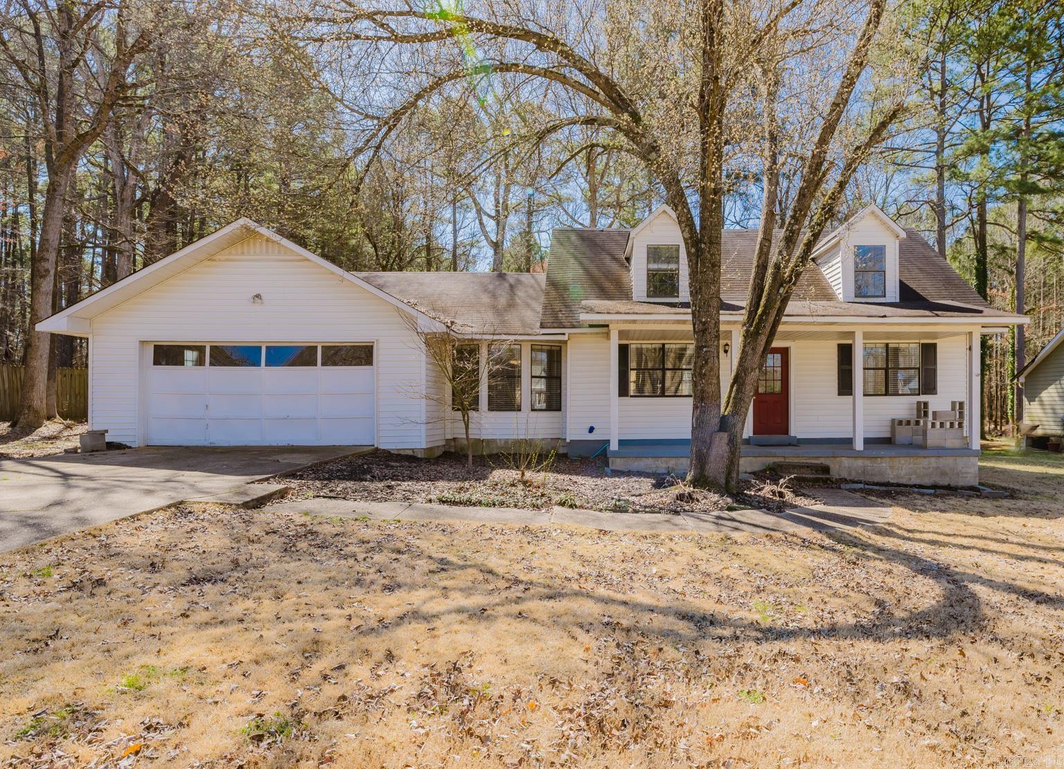 Welcome to the cutest country charmer on the block! As you enter the home, you'll be greeted by a spacious living room with a cozy wood-burning fireplace. There is a breakfast bar separating the living room from the kitchen, offering a nice open floorplan. The kitchen has a breakfast nook, granite countertops, plenty of cabinets, and a pantry. There is a large laundry room off the kitchen. The primary bedroom & full bath are downstairs as well, with a nice walk-in closet. Primary BR has brand new carpet. There are 2 bedrooms upstairs with a full bath...these bedrooms are very spacious!. The entire upstairs has been freshly painted. This home sits on a large Lot, is fully fenced and the backyard has a nice deck to relax on. There is a new storm door leading out the back, as well as, a new overhang over the back door. There are dual HVAC units (downstairs being replaced in 2022 / upstairs replaced in 2024). Garage door opener replaced in 2022.