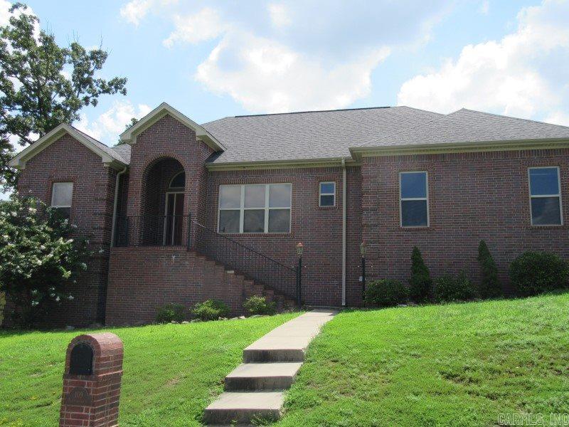 1 Level brick w/ oversized 2.5 car side load garage w/ extra storage. Very open living with cedar hardwood floors in den, kitchen, dining, & third bedroom. Vaulted ceiling with large den windows for max light with elevated views. Brand new fence & all new carpet. Separate dining room could be music, office or second living area. Master suite has large organizational closet, $3000, luxury jetted tub & tile shower. Kitchen has breakfast bar & granite. Large laundry & floored attic. Utilities are ALL ELECTRIC!