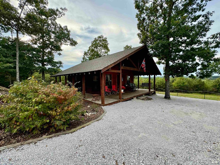 This log cabin with an amazing view is nestled on the side of a mountain just 16 miles outside of Mountain View and only 2 hours north of Little Rock. You’ll love sitting on the wrap around porch and enjoying the serene views and the peace and quiet that only the Ozarks can offer. With one bedroom downstairs and a loft upstairs, that can be used as a second, you’ll have plenty of room for your mountain getaways.