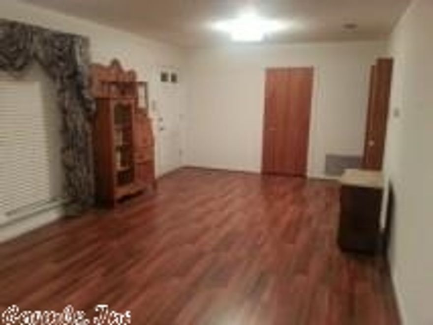 Three BR, two bths, formal living room, formal dining room, den, new laminate flooring and so much more must see to appreciate.